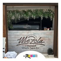 Logo Mezcla Monopoli stampato su legno